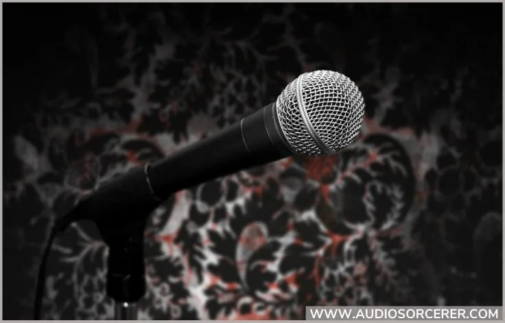 Picture of a Shure SM58 on a microphone stand.