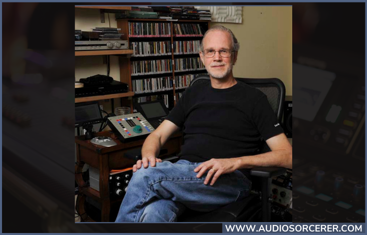 Audio engineer Bob Katz sitting in a chair in a recording studio.