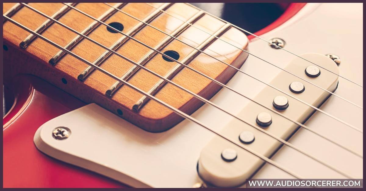 A red Fender Stratocaster featuring a single coil pickup.