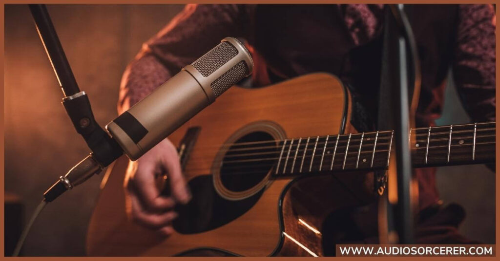 Miking an acoustic guitar on the 12th fret.