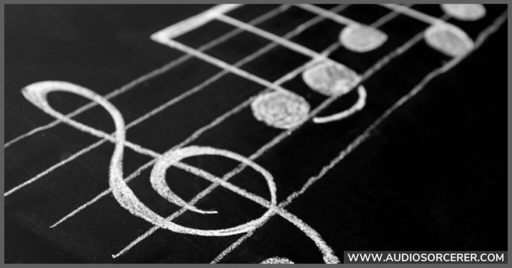 Note on a scale written on a chalkboard.