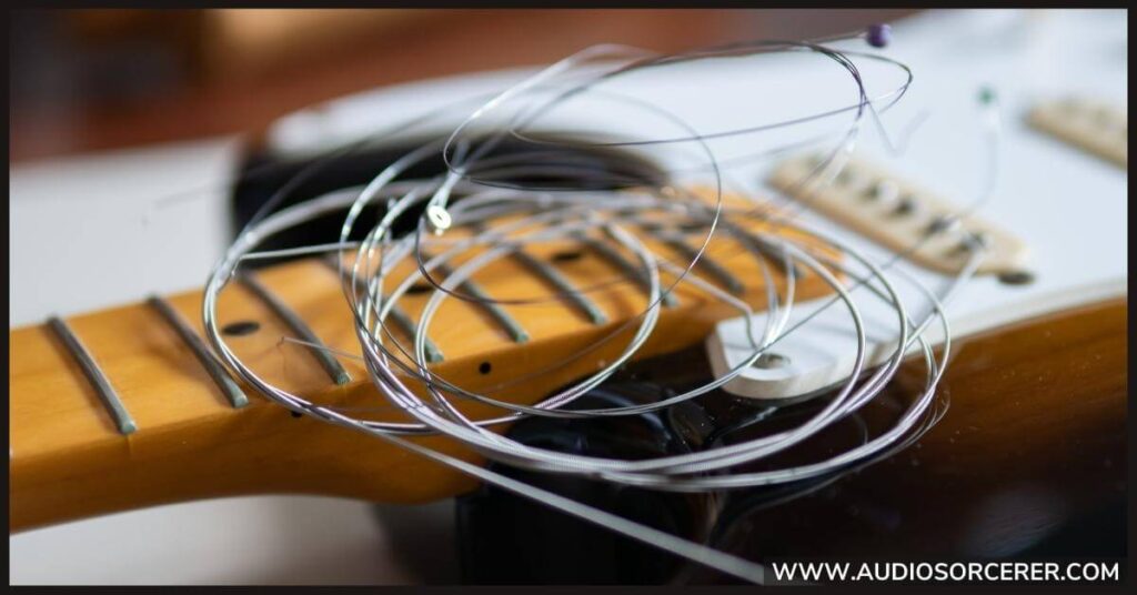 Roundwound guitar strings on a Fender Stratocaster.