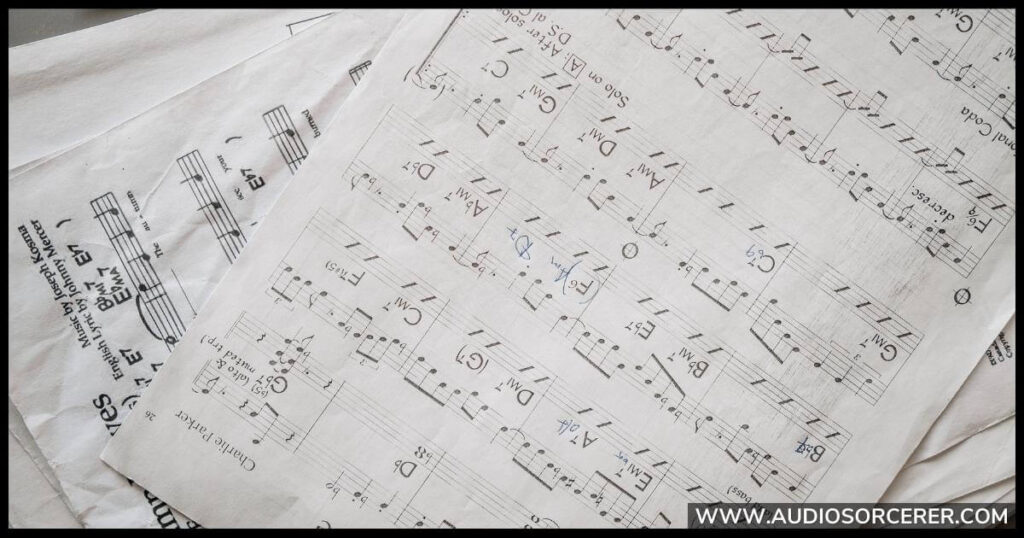 Notes and chords shown on pages of sheet music.