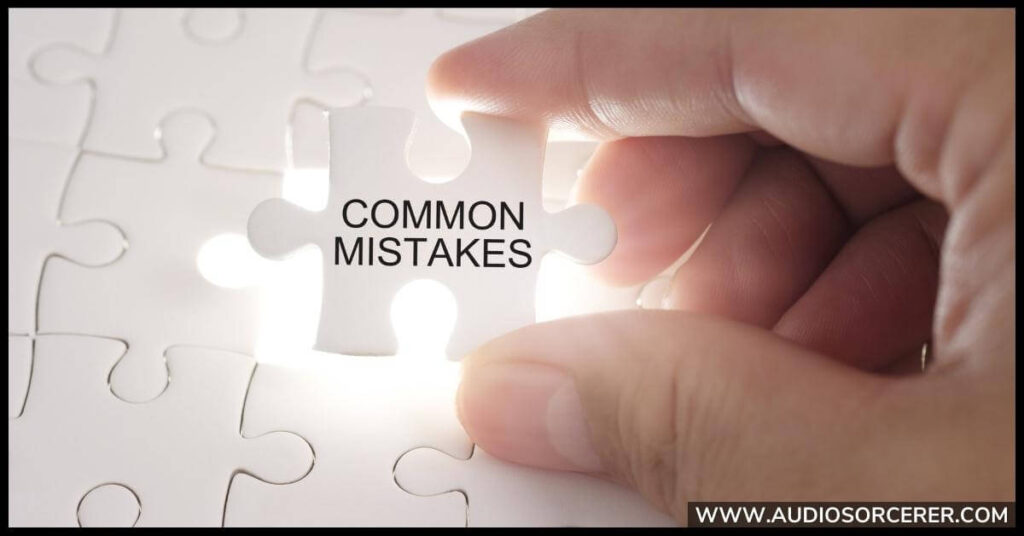 A close-up of a hand holding a puzzle piece that says "Common Mistakes".