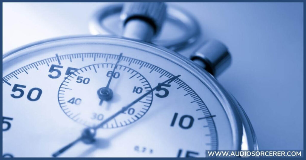 A silver stopwatch representing the manual way of finding the tempo of a song.