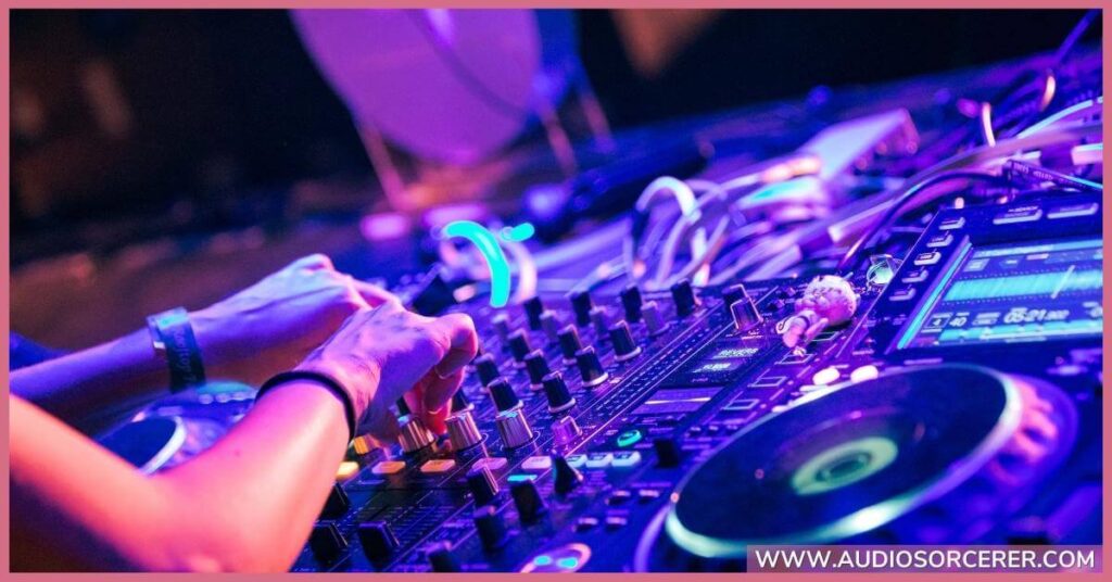 DJ mixing live at a show.