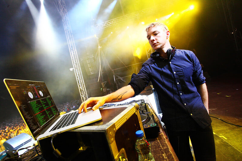 Diplo, a DJ, performing for a live audience.