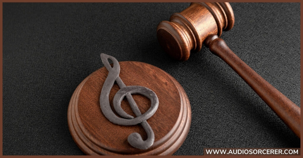 A gavel with a musical note.