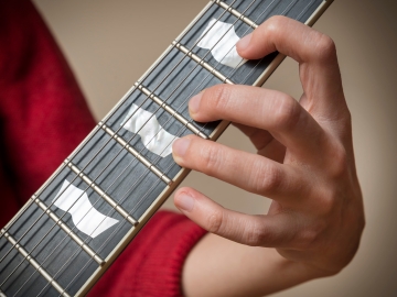 Pearloid guitar inlays.