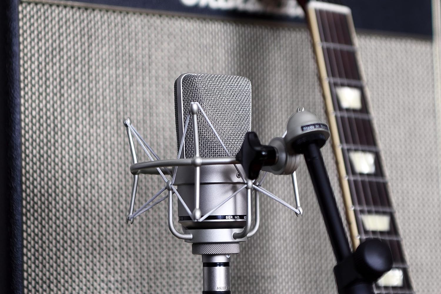 Neumann TLM 103-MT microphone.